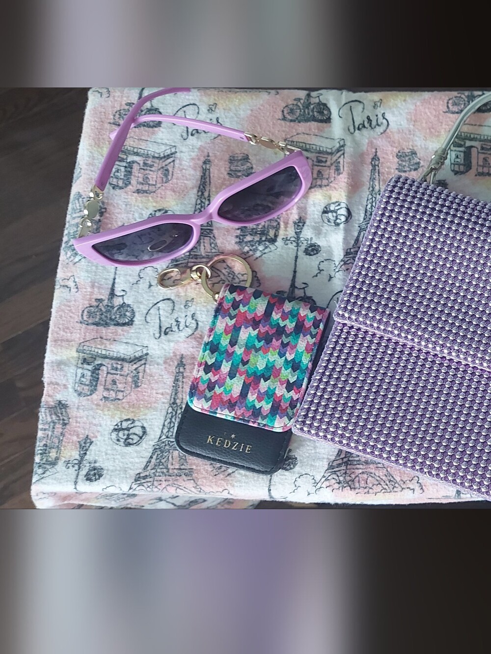 Purple Bundle includes; Purse, Cardholder Keyring and Sunglasses